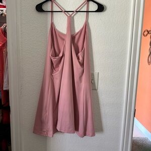 Brand new only the tags have been removed never worn rose colored sports dress
